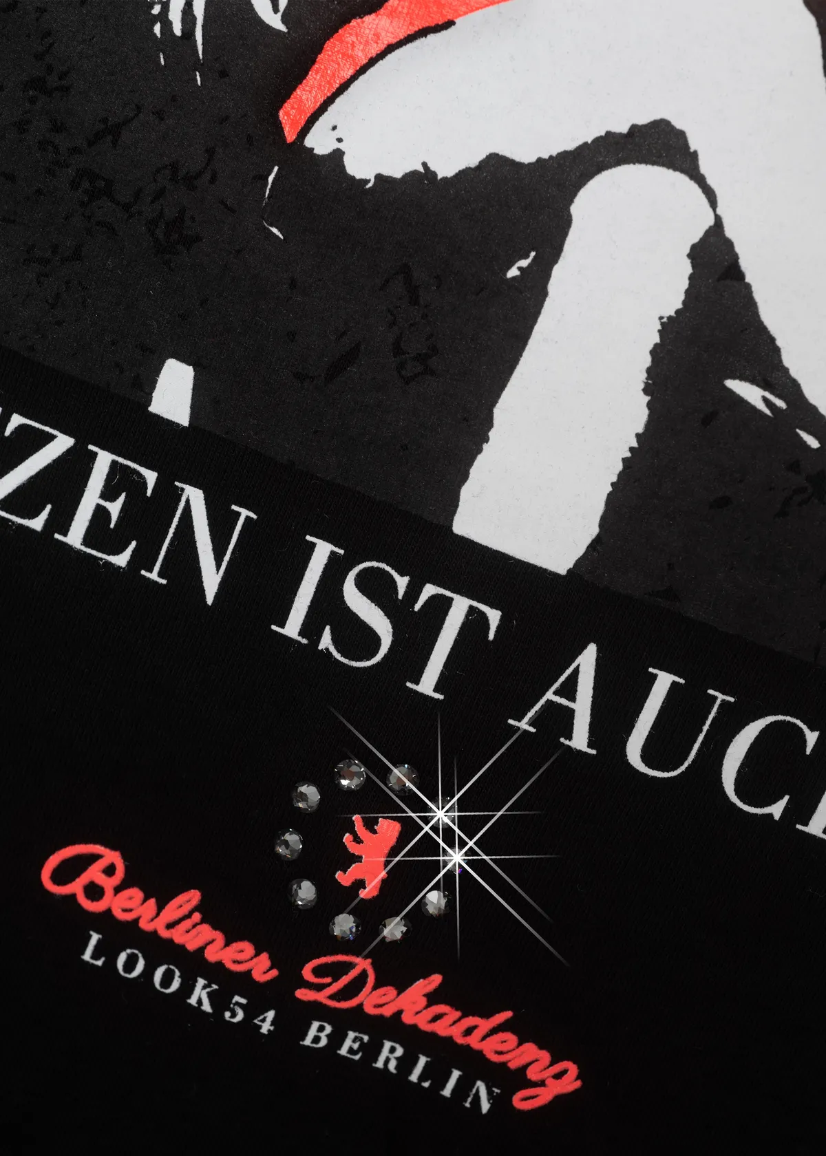 Sitzen ist auch o.k. Batwing Shirt